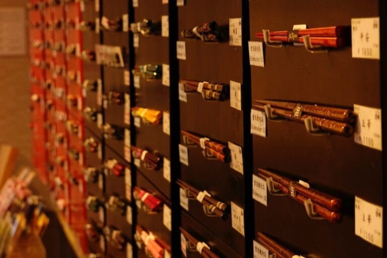 chopsticks being displayed on the wall in a chopstick store in Japan