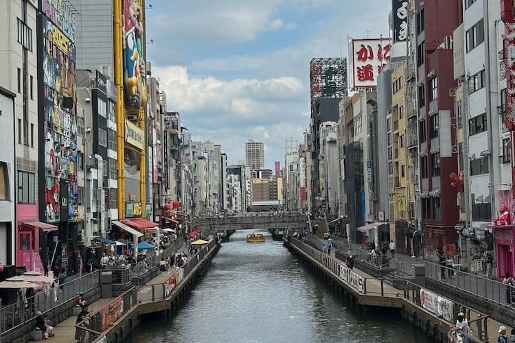 Dotonbori river in Osaka, view from dotonbori bridge during the day