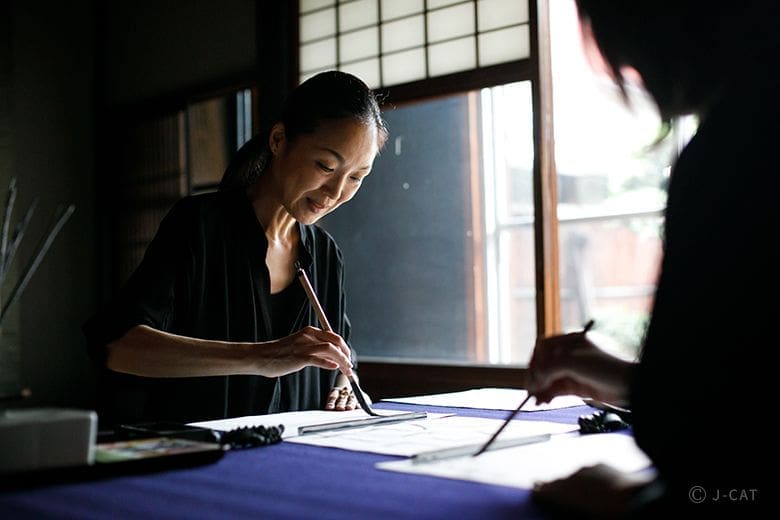 Japanese Calligraphy class in Kyoto in historic samurai mansion