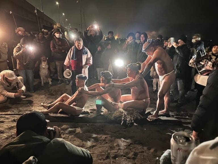 Participants wearing fundoshi preparing for a ritual during the Sagicho Festival in Oiso.