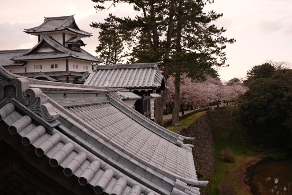 Kanazawa Castle tiled roof with cherry blossoms