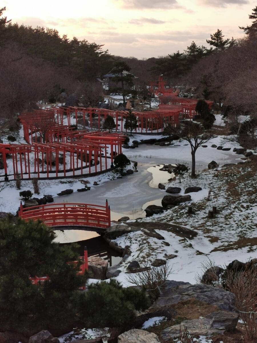 Takayama Inari Shrine in winter with red torii and bridges